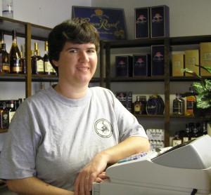 Becky McCray working the cash register at her store.