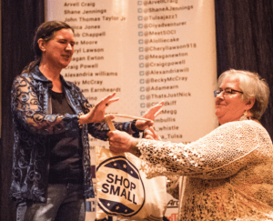 Photo by th3truthphoto Becky McCray speaking with Deb Brown assisting