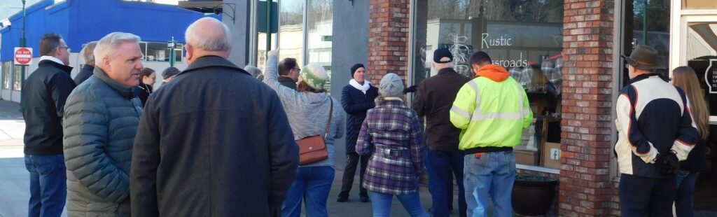Becky McCray leads a group in a walking workshop in the small town of Castle Rock, Washington.