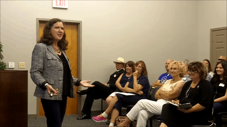 Becky McCray speaking to an audience in a small room