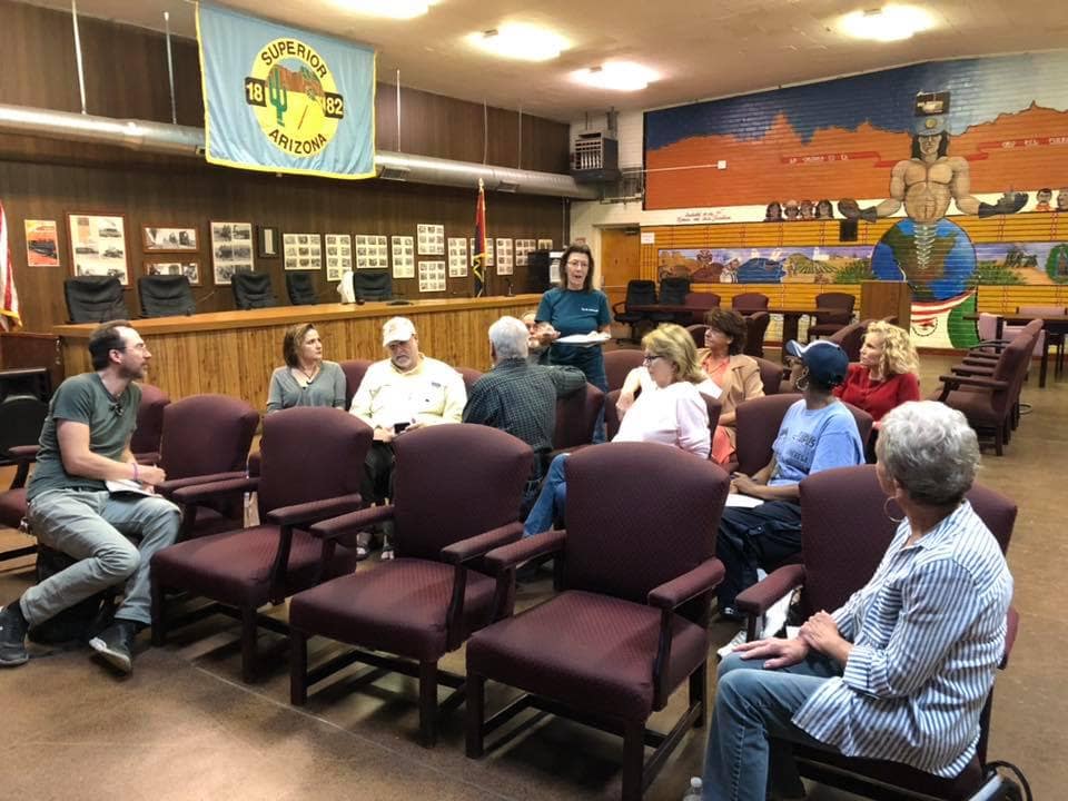 A watch party group discussing what they've just learned.