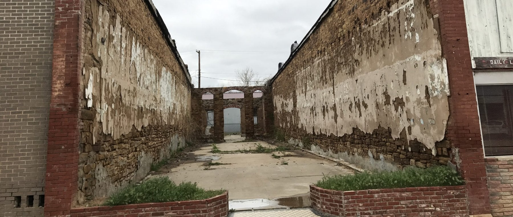 An empty shell where a downtown building once stood