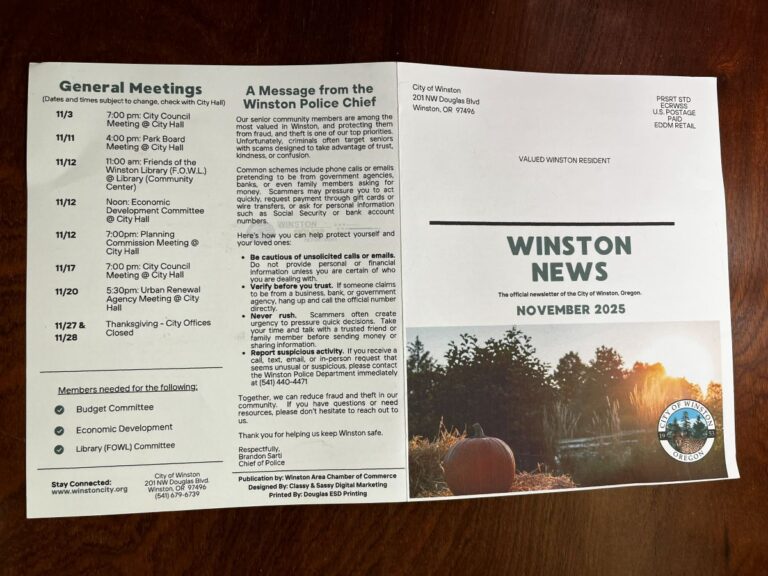 The City of Winston, Oregon paper newsletter laid flat showing the front cover with mailing details and news stories on the back.